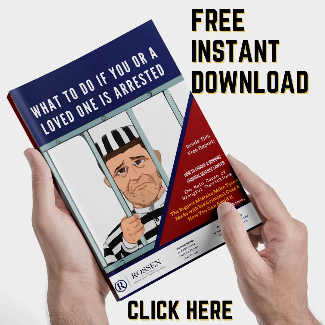 hands hold a booklet that reads what to do if arrested in South Florida - written by Fort Lauderdale Criminal Defense attorneys, click the image to go t a free download page