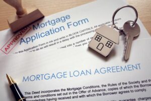 Mortgage loan agreement paperwork and keys